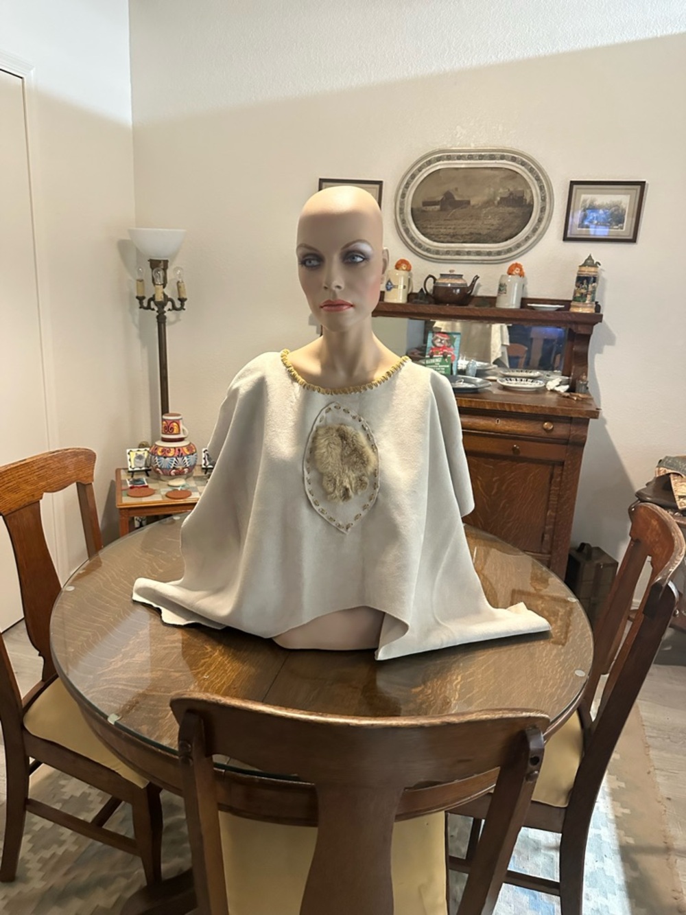 Hand Crafted Elk Skin Cream Poncho with Real Lynx Paw Medallion